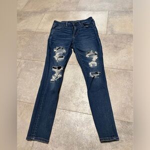 American Eagle “next level stretch” distressed hi-rise jeggings size 8